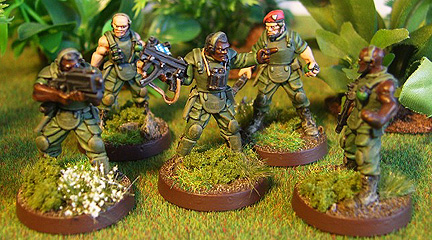 eM-4 Troopers
Centre figure 0011 Trooper Squad leader. MAR. Bareheaded. Binos, with arms from SFP6a Command Arms pack.