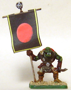 eM-4  plastic Orc Standard Bearer

Essentially a stock figure: I added a sword in his left hand and a wire standard. The banner was printed on my computer.