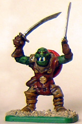 eM-4  plastic Orc Hero/Champion

Both hands were drilled for swords, and raised to a more aggressive pose.